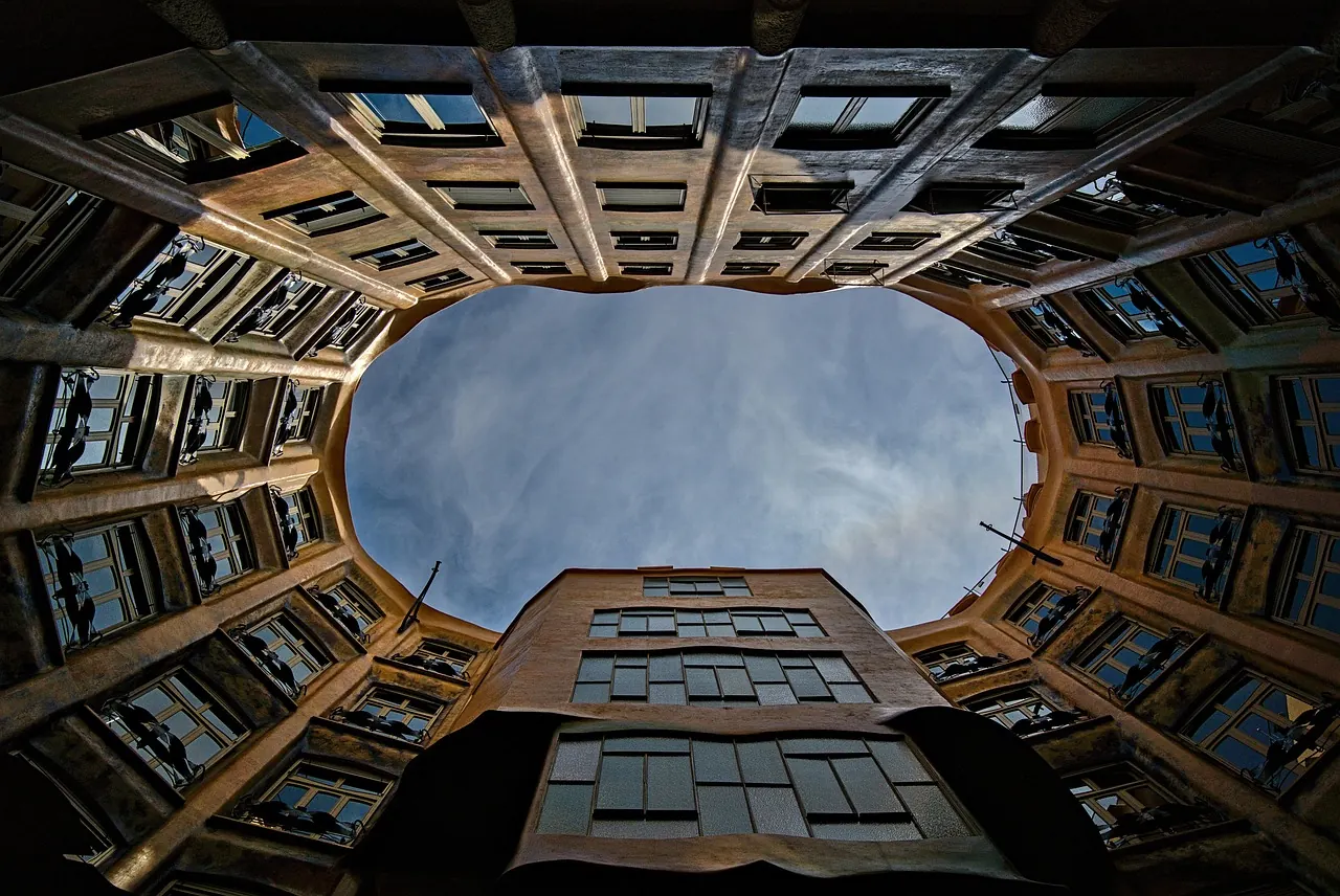Apartment buildings around a courtyard seen from below