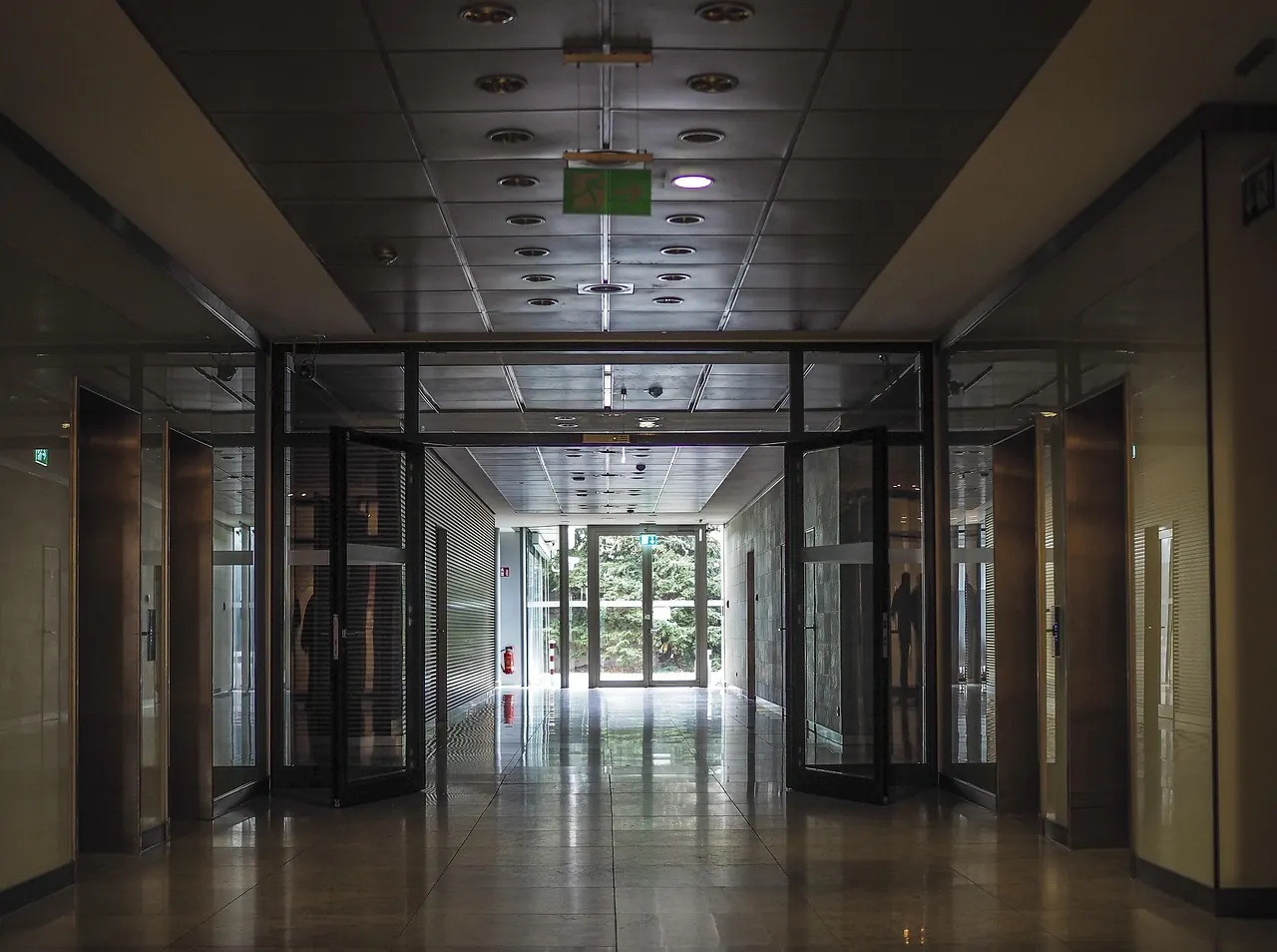 Office corridor with aluminium framed glass sliding doors