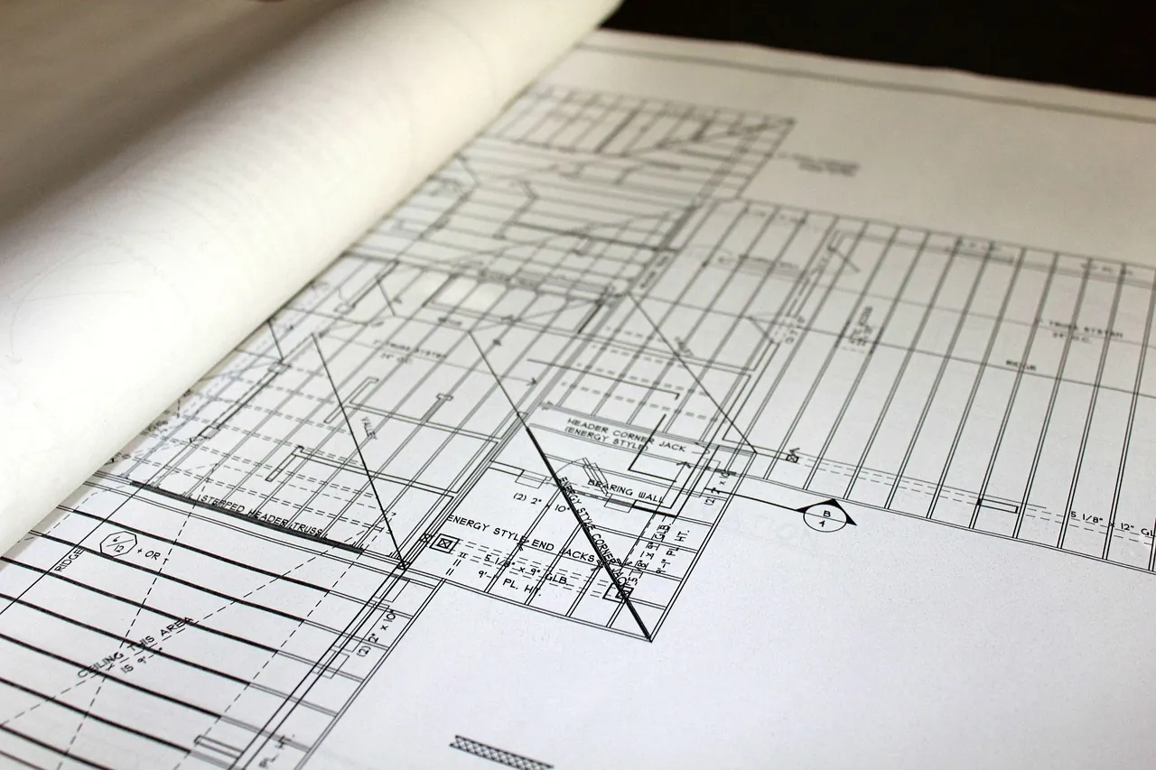 House plan blueprints laid out for review