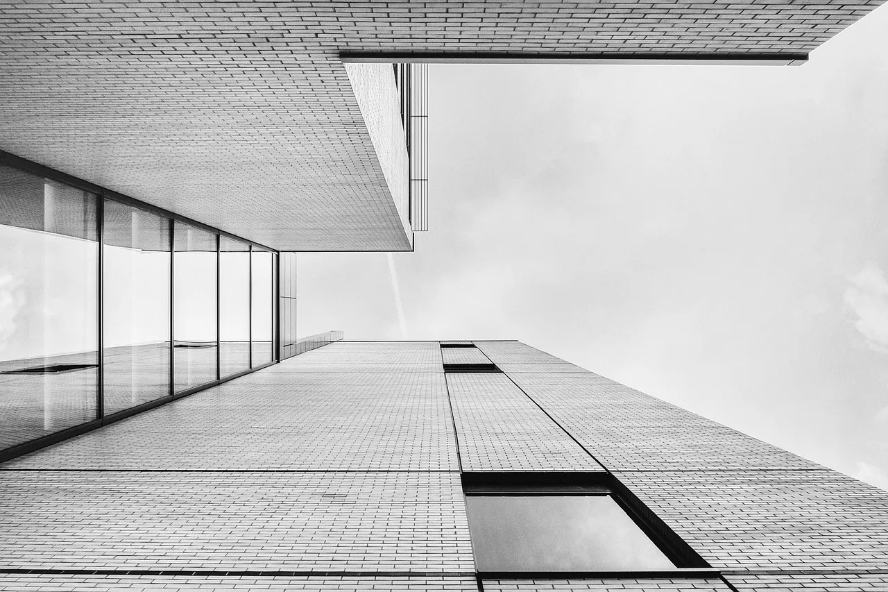 Modern commercial building with a cantilevered upper floor