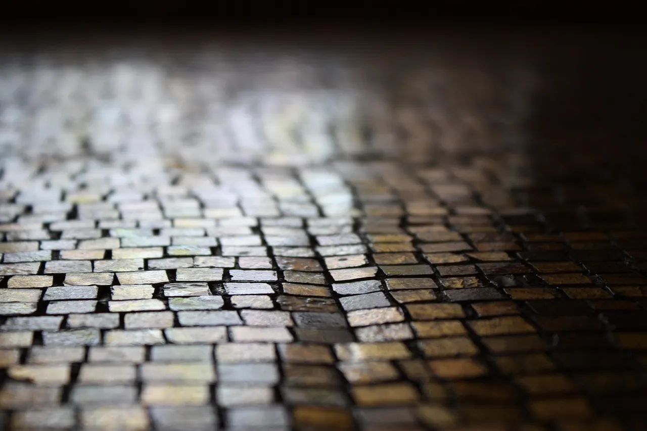 Paved walkway laid with interlocking paving blocks