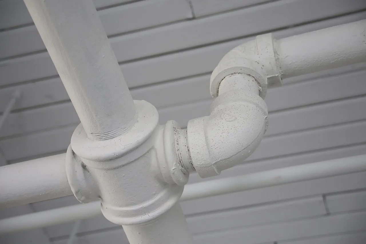 PVC pipe and elbow fittings for a plumbing installation